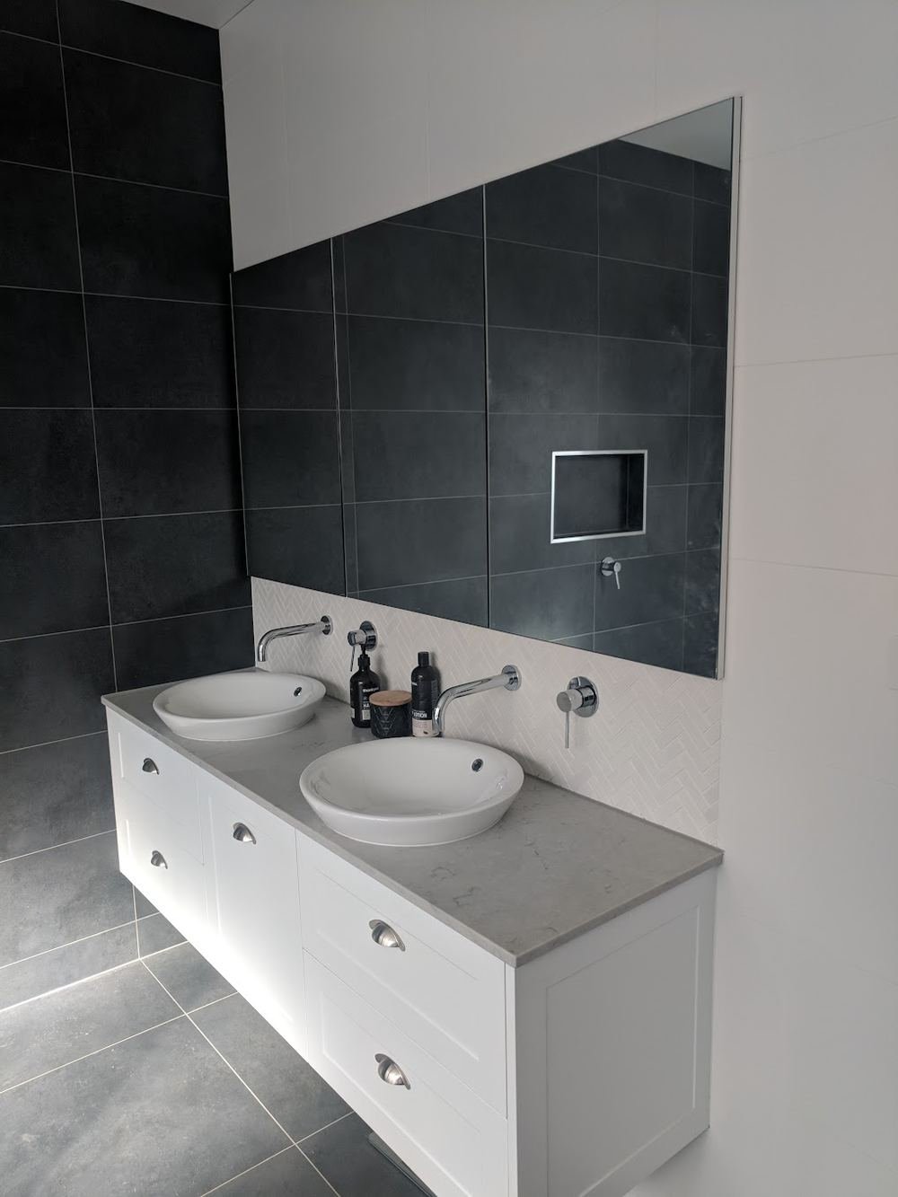 New double vanity installed in a renovated bathroom
