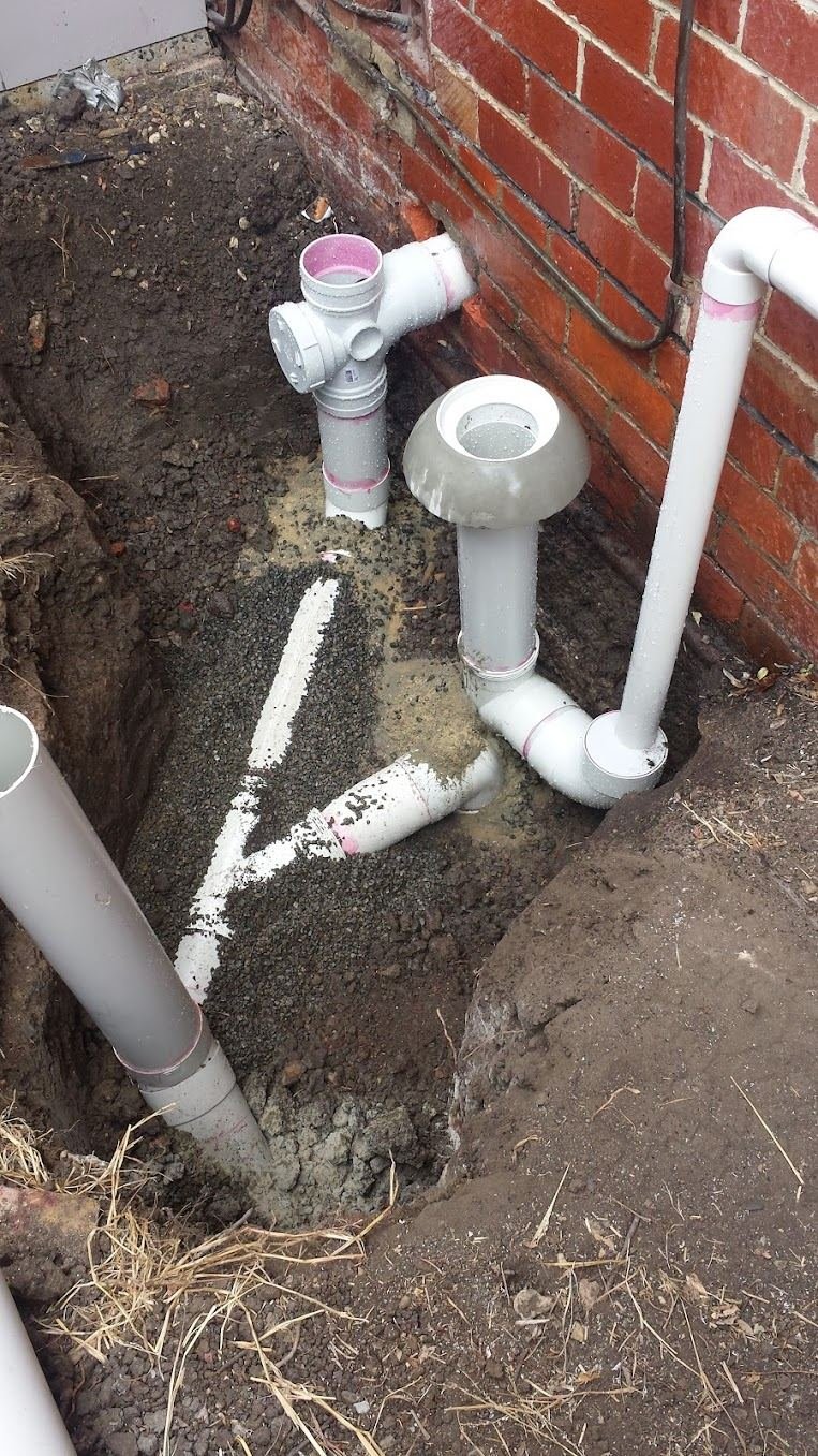 New PVC sewer points and overflow relief gully in a fresh trench